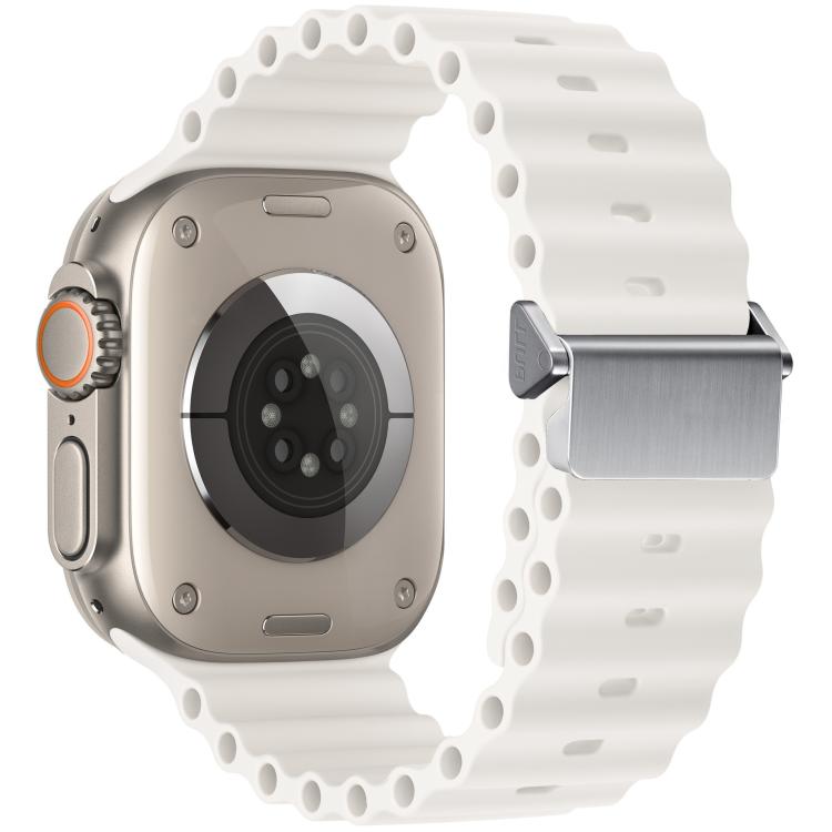 White Ocean silicone Apple Watch band with magnetic buckle, shown on a watch