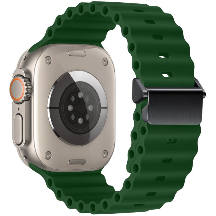 Dark green Ocean silicone Apple Watch band with magnetic buckle, shown on a watch