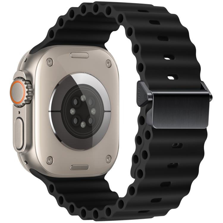 Black Ocean silicone Apple Watch band with magnetic buckle, shown on a watch