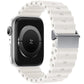 White silicone watch band with perforated links and magnetic metal buckle