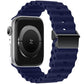 Navy Ocean silicone Apple Watch band with magnetic buckle, shown on a watch face