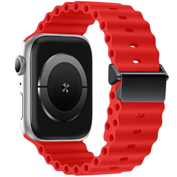 Red silicone watch band with magnetic buckle shown attached to a smartwatch