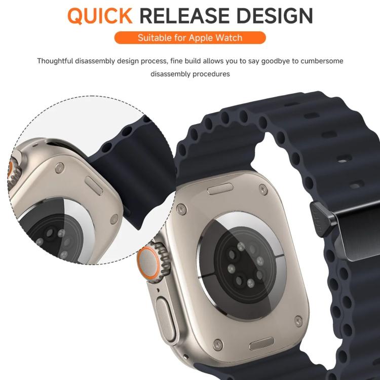 Dark navy silicone watch band with perforated edges and quick-release attachment