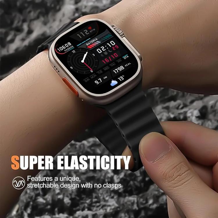 Black silicone watch band stretched on a wrist, showing its flexible fit