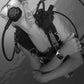 Black watch band worn underwater with a smartwatch