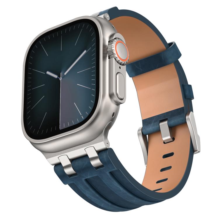 Navy blue vegan leather watch band with silver buckle, shown attached to a silver smartwatch
