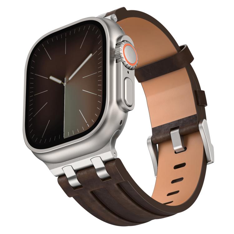 Deep brown vegan leather watch band with silver buckle, shown attached to a silver smartwatch