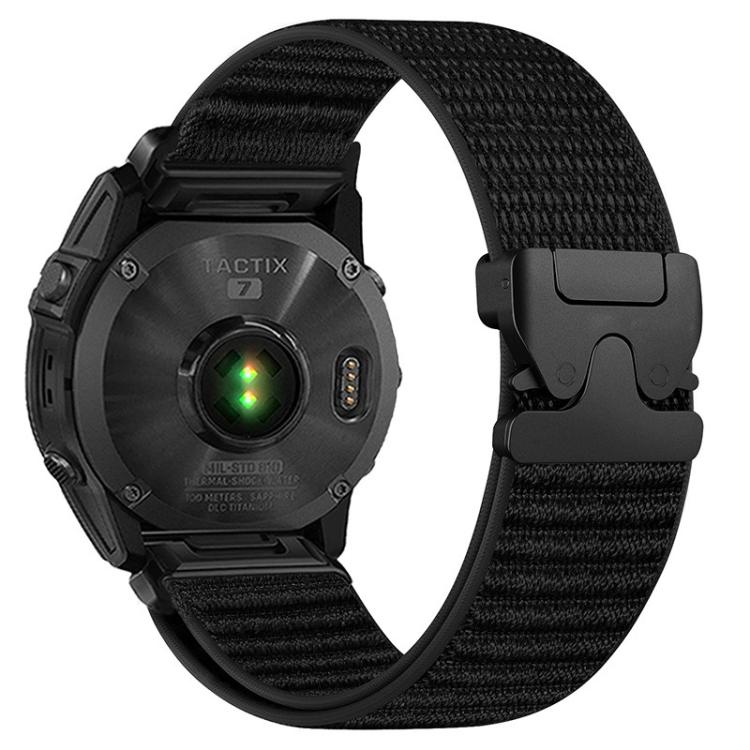Black woven nylon watch band with black parachute buckle on a black watch