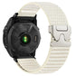 Ivory woven nylon watch band with light buckle, fitted to a watch