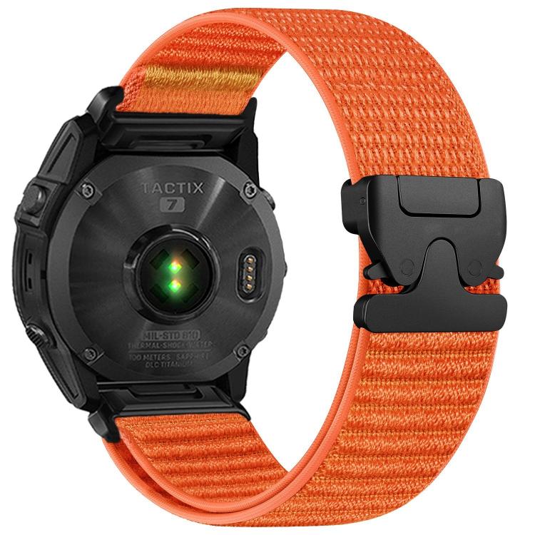Orange woven nylon watch band with black parachute buckle on a black watch