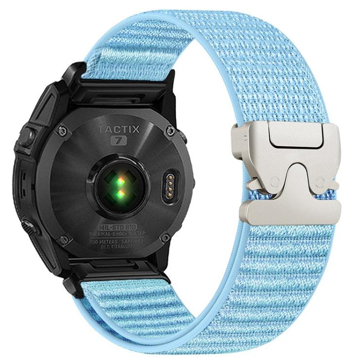 Light blue woven nylon watch band with light metal buckle, shown attached to a watch.