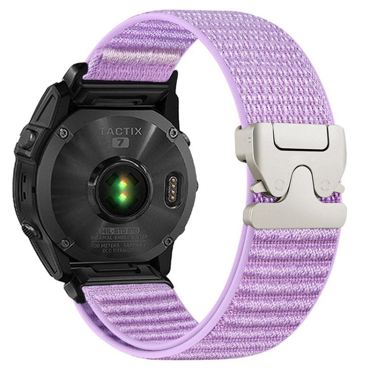 Lavender woven nylon watch band with light metal buckle, shown attached to a watch.