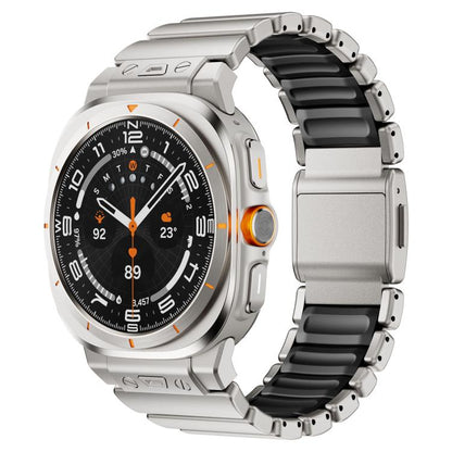 Silver smartwatch with a black silicone and stainless steel link band and magnetic clasp