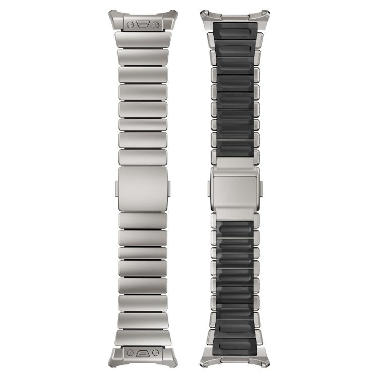 Two views of a silver watch band, showing its metal links, black silicone inserts, and clasp