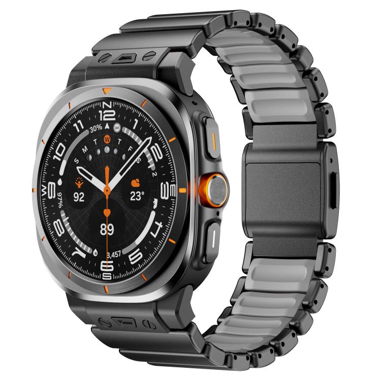 Dark smartwatch with a gray silicone and stainless steel link band and magnetic clasp