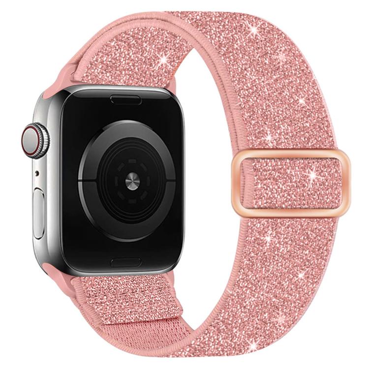 Pink glitter elastic nylon watch band with rose gold-tone buckle, shown on a smartwatch