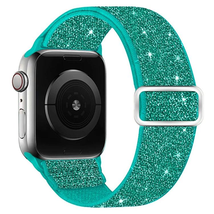 Cyan glitter elastic nylon watch band with silver-tone buckle, shown on a smartwatch