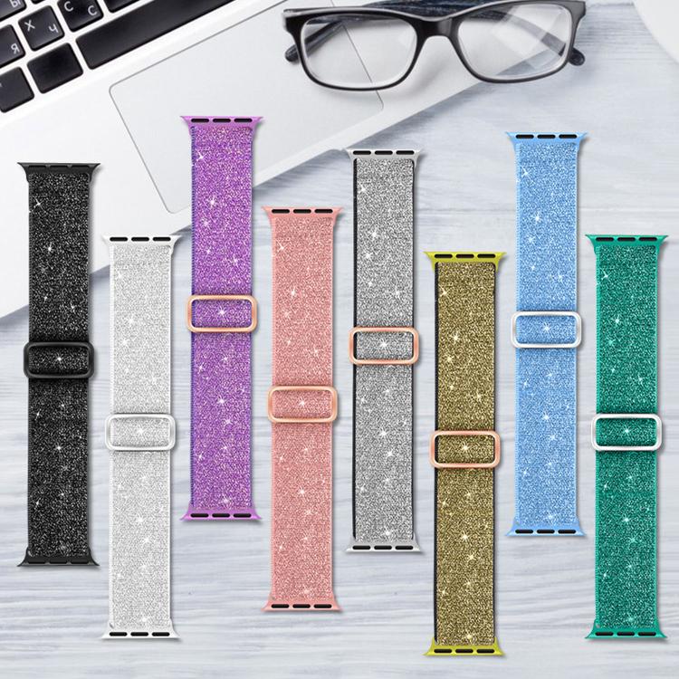 Eight glitter elastic nylon Apple Watch bands in black, silver, purple, pink, gray, gold, blue, and teal.