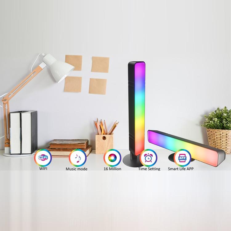 RGB desktop ambient light bars with remote on table setup, colorful light strips