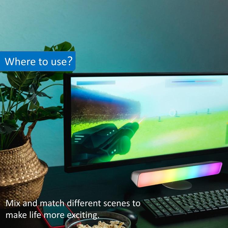 RGB desktop light bar under TV, multicolor glow along a horizontal strip