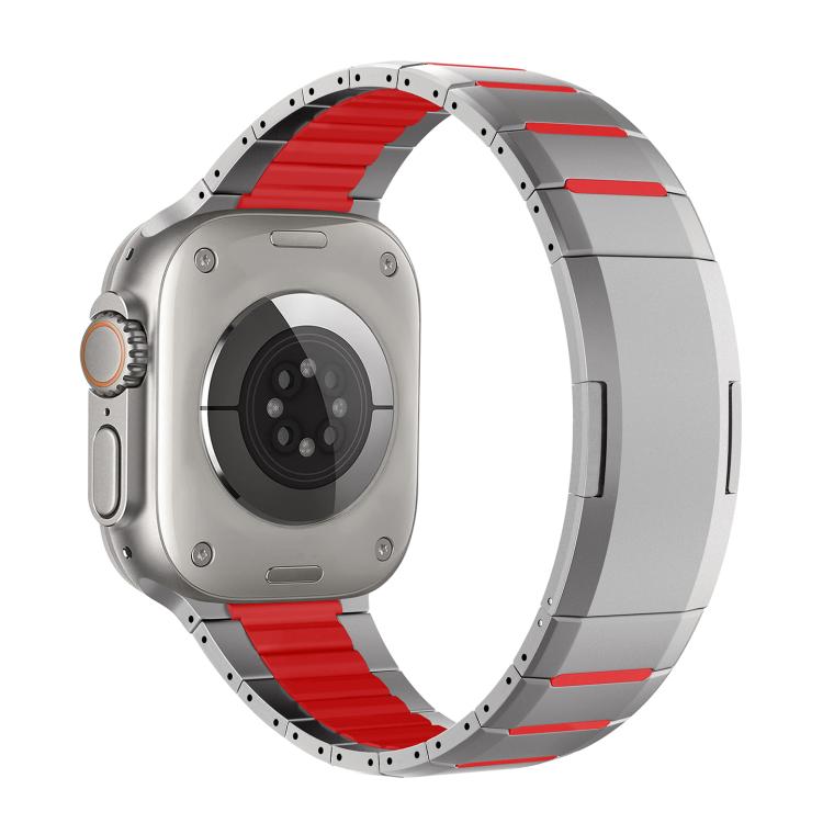 Two-tone stainless steel watch band with silver links and red accents, shown attached to a watch
