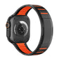 Black stainless steel watch band with vivid orange accents, shown attached to a watch