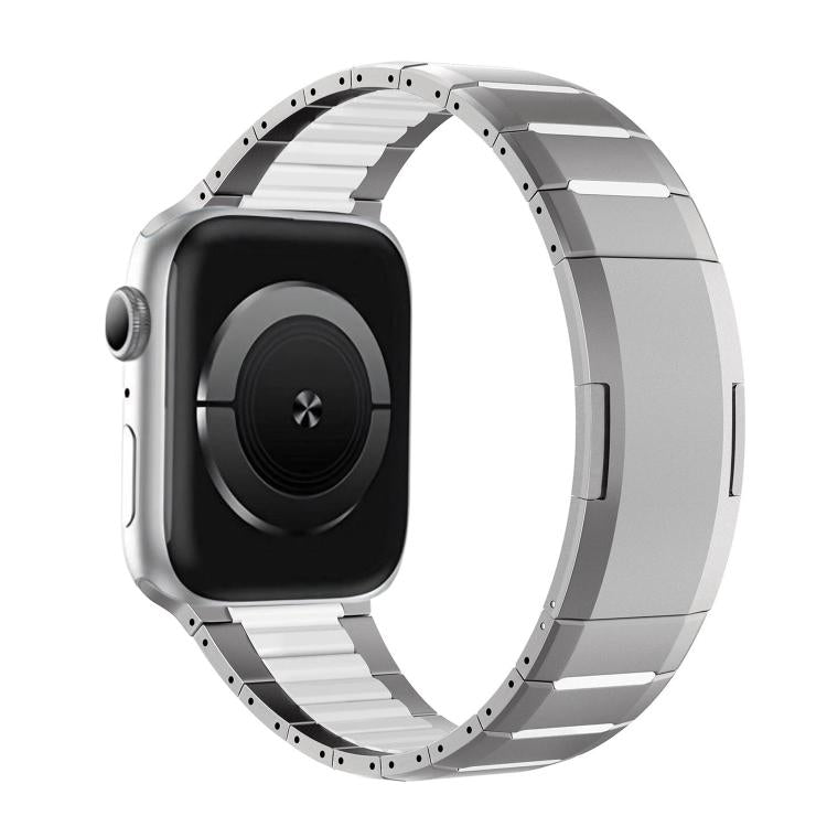 Two-tone stainless steel watch band with silver links and white accents