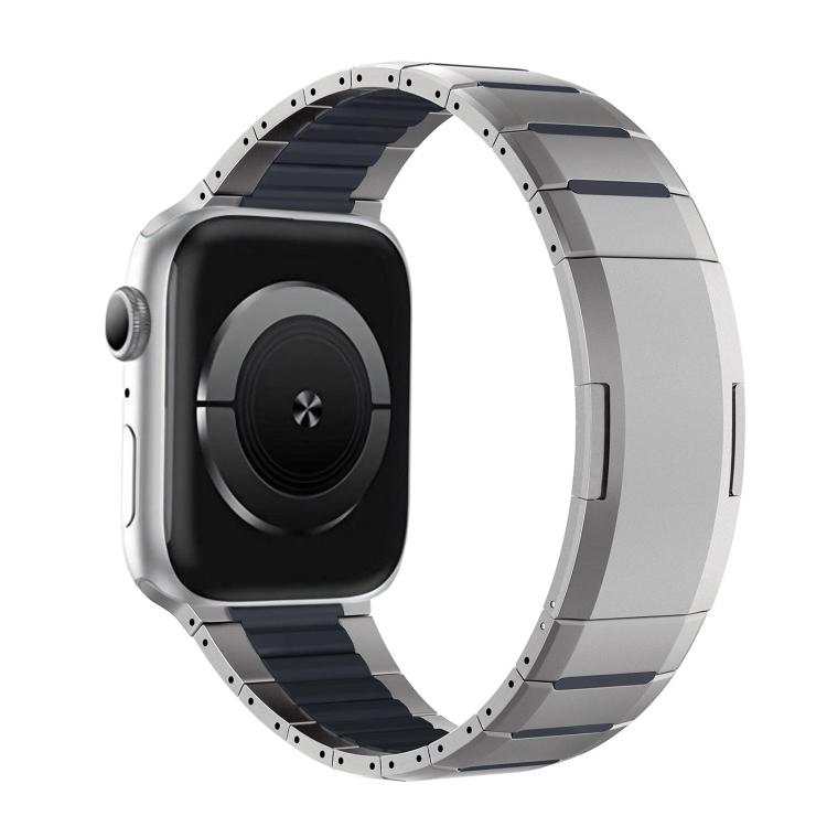 Two-tone stainless steel watch band with silver links and dark blue accents