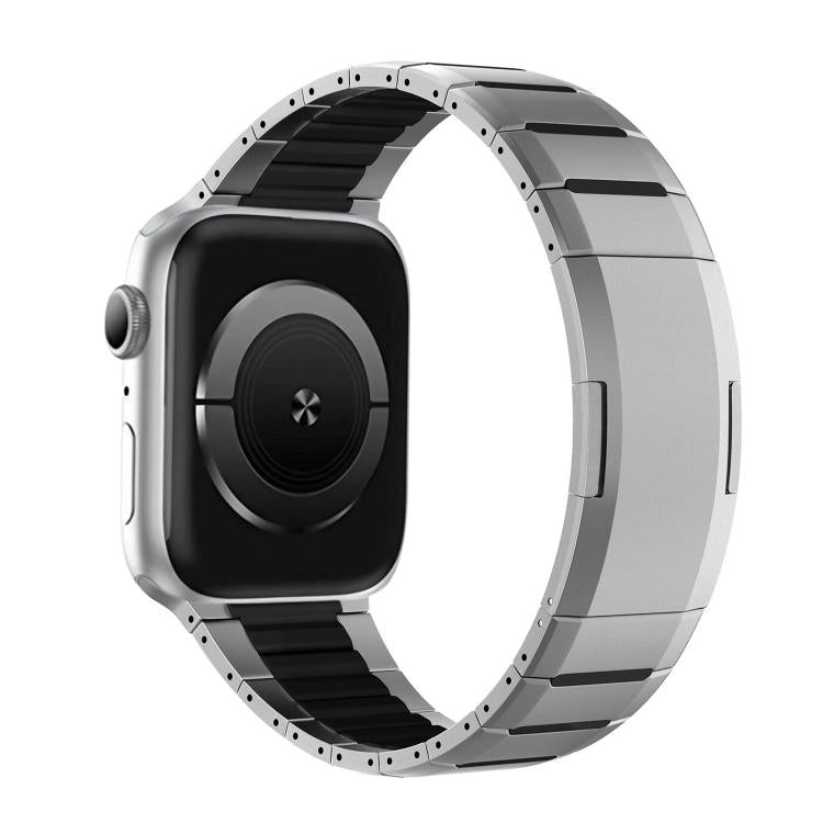 Two-tone stainless steel watch band with silver links and black accents