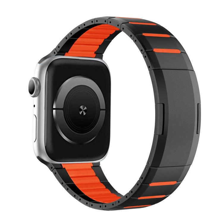 Black stainless steel watch band with bright orange accents, shown on a watch
