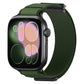 Green woven nylon Apple Watch band with magnetic metal tip, shown on a smartwatch.