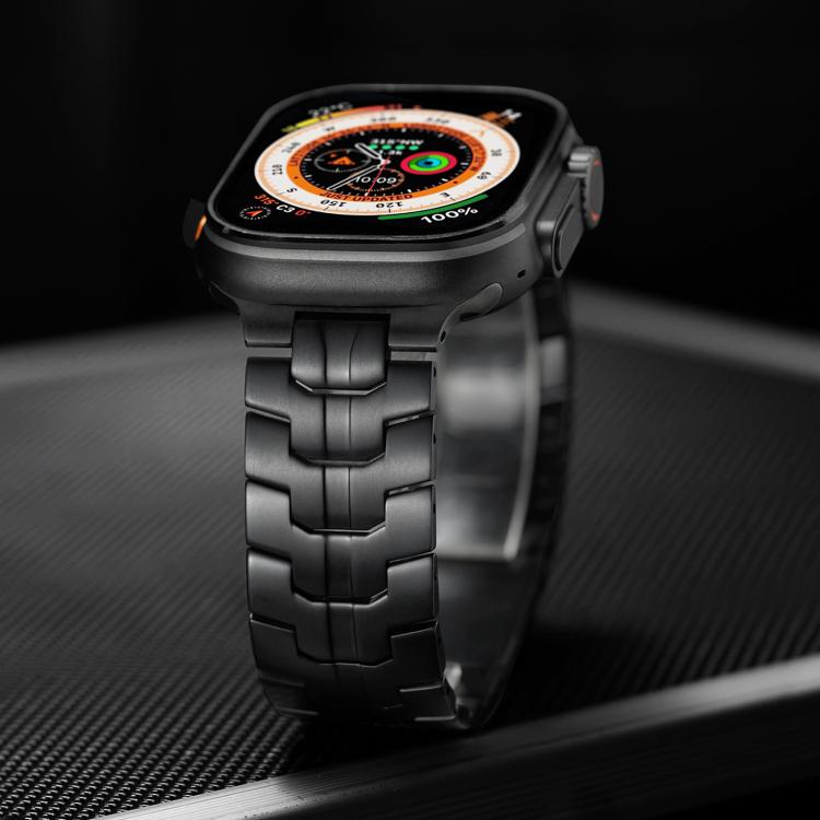Black metal watch band fitted to a smartwatch, showing its linked bracelet.