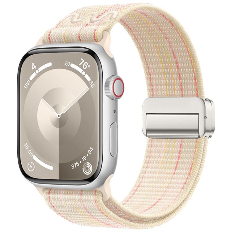 Cream nylon Apple Watch band with pink stripes and a silver magnetic buckle