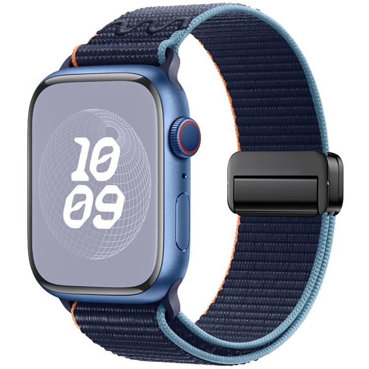 Apple Watch with a navy woven nylon loop band, blue trim, and black magnetic buckle