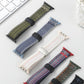 Six detached nylon Apple Watch bands in assorted colors with magnetic buckles