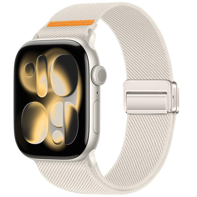 Nylon watch band in light cream with orange accent and magnetic buckle, shown on a smartwatch
