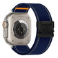 Navy woven nylon watch band with reflective stitching, orange accent, and black buckle