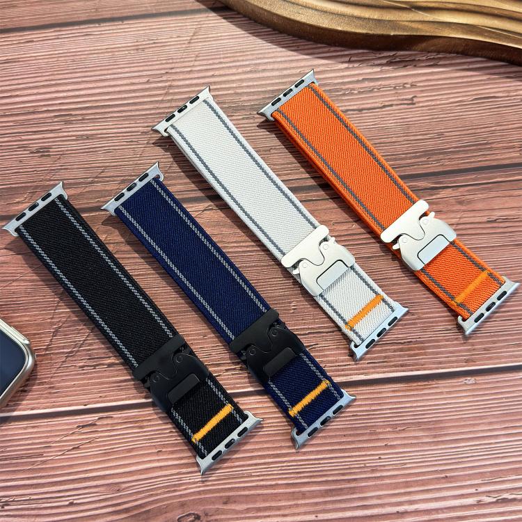 Black, navy, white, and orange woven nylon watch bands with reflective stitching