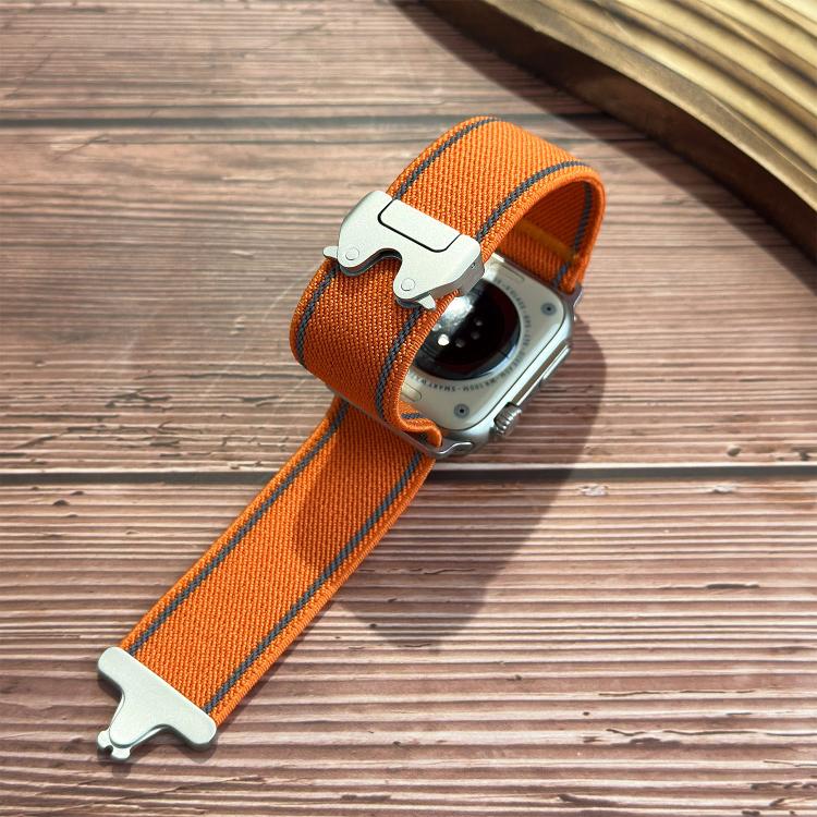 Orange woven nylon watch band with reflective edge stitching and silver buckle, fitted to a smartwatch.