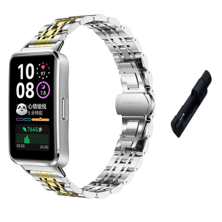 Silver watch band with gold accent links, smartwatch, and removal tool