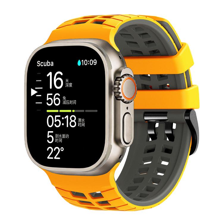 Yellow and dark gray perforated silicone watch band fitted to a smartwatch.