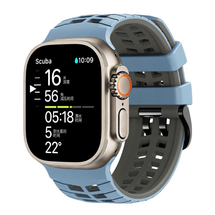 Light blue and dark gray perforated silicone watch band fitted to a smartwatch.
