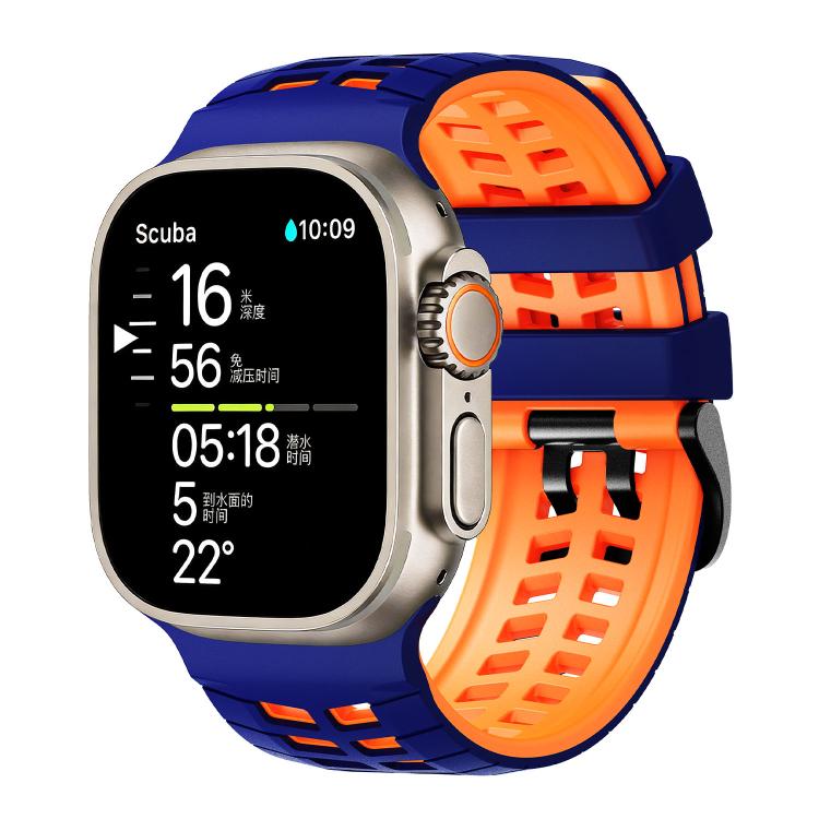 Two-tone silicone watch band with tire-tread slots, blue exterior and bright orange interior