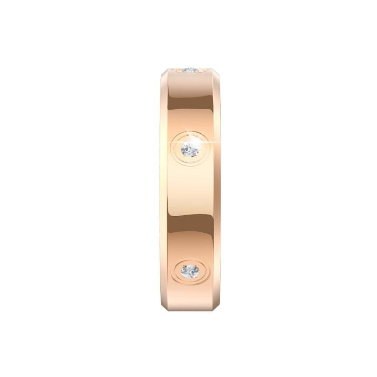 Side view of a gold-tone smart ring with two clear stones.