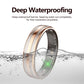 Rose gold and silver smart ring shown partially submerged in water