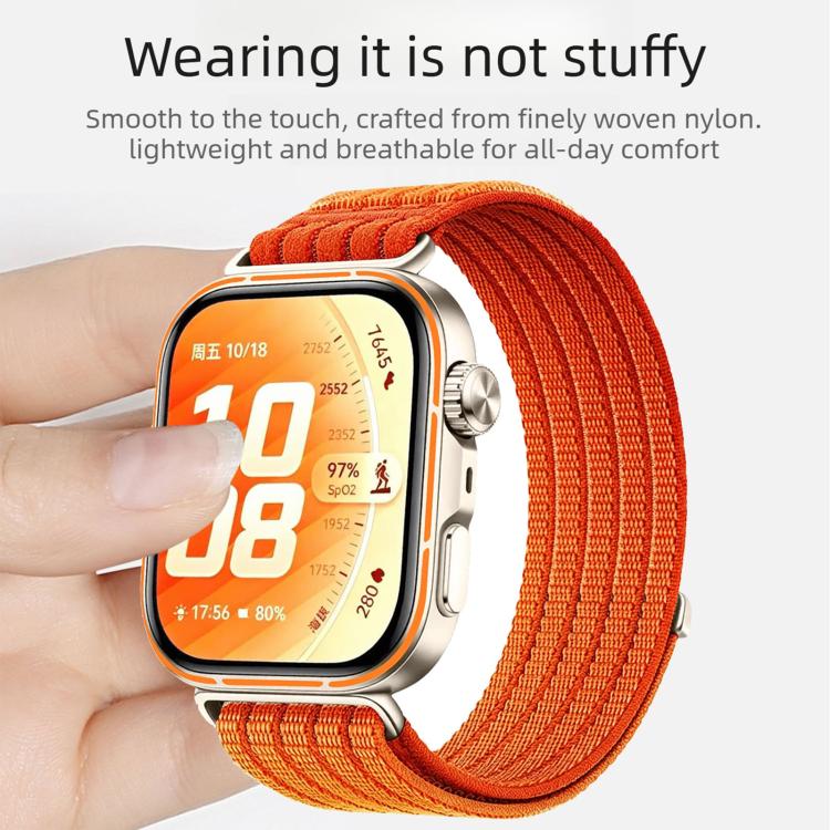 Orange woven nylon watch band fitted to a smartwatch on a wrist