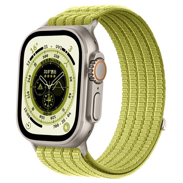 Bright yellow-green woven nylon Apple Watch band with a silver watch case