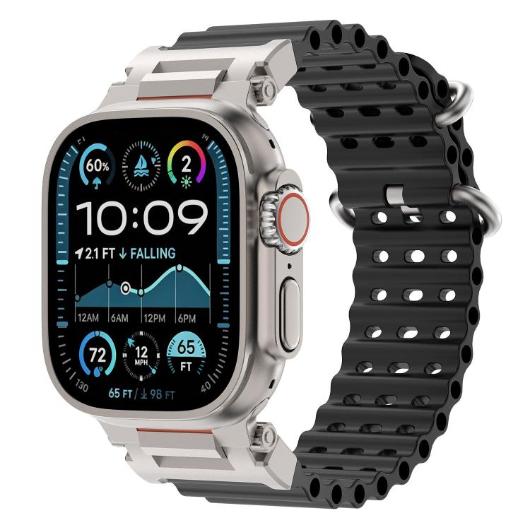 Black perforated silicone watch band with metal connectors on a compatible watch.