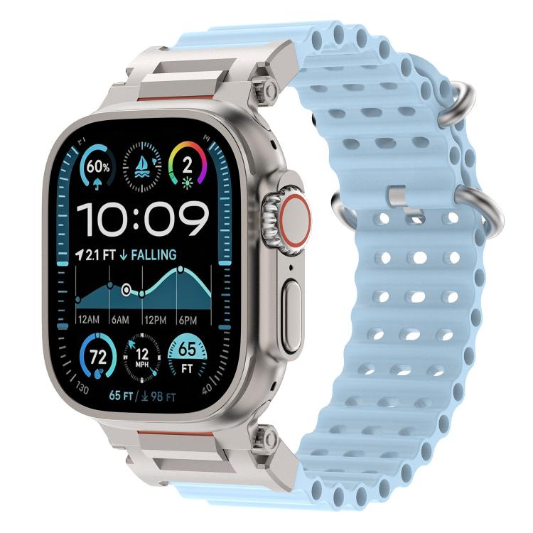 Light blue perforated silicone watch band with metal connectors, attached to a smartwatch