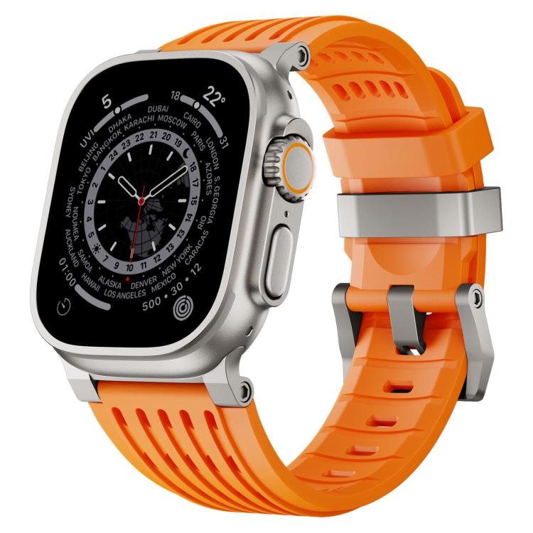 Orange breathable silicone watch band with stainless steel double-ring buckle on a silver watch